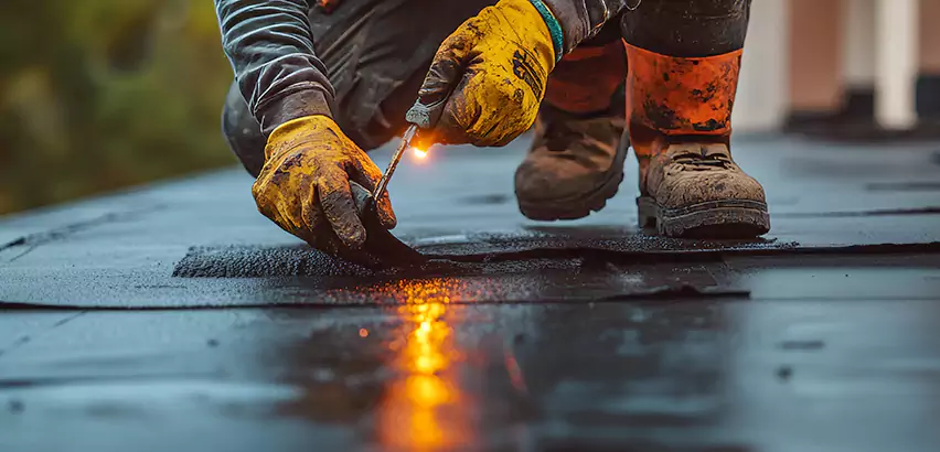 EPDM Roof Repair Tape Application in Bellevue