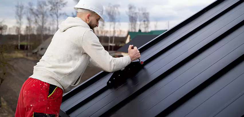 Tin Roof Ridge Cap Installation in Bellevue